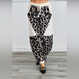 POL Taupe Leopard Print Quilted Pants
Size Small
